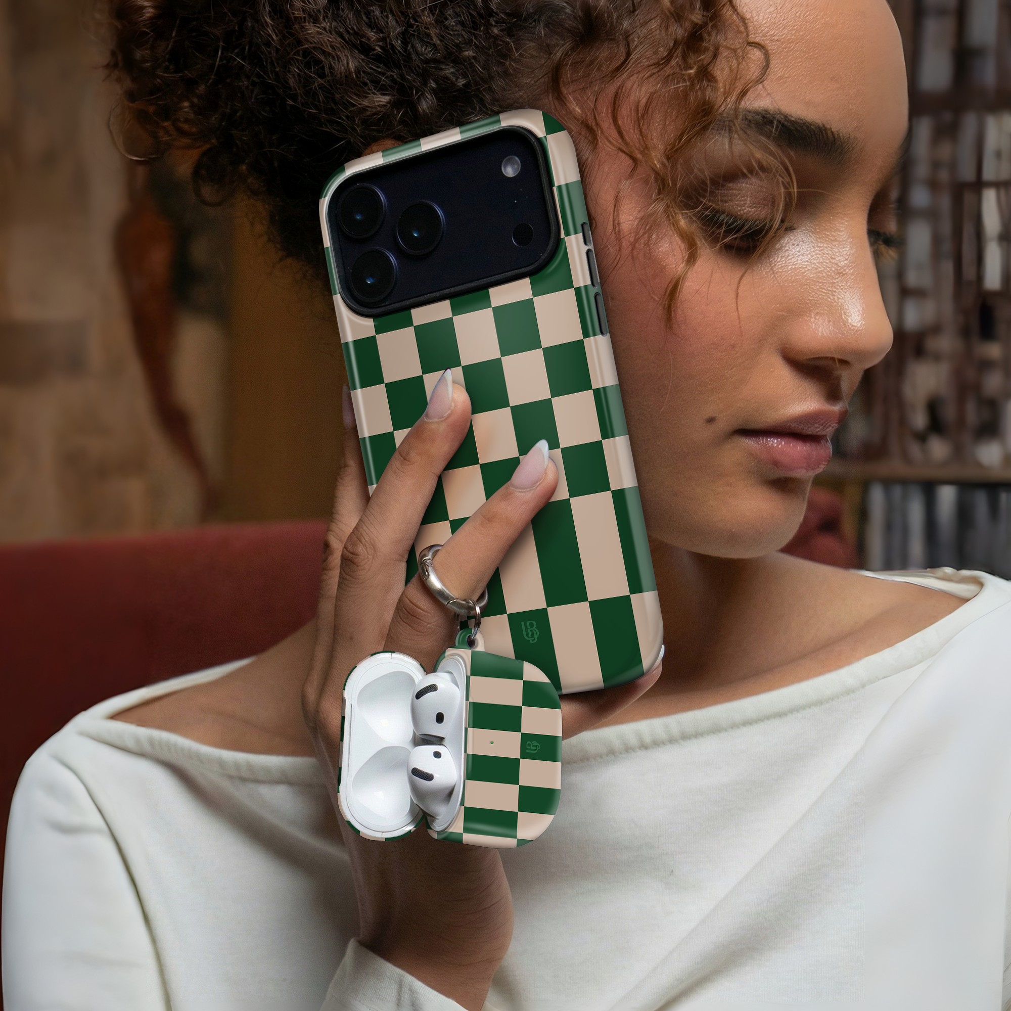 Emerald Grid Ultrabling AirPods case detail view