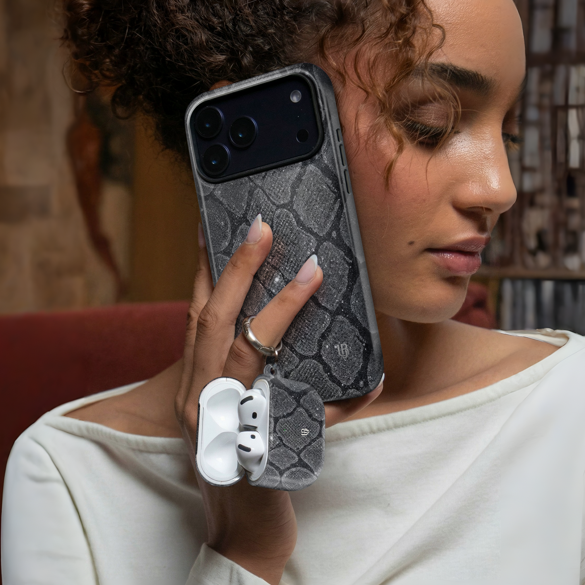 Ash Python Ultrabling AirPods case detail view