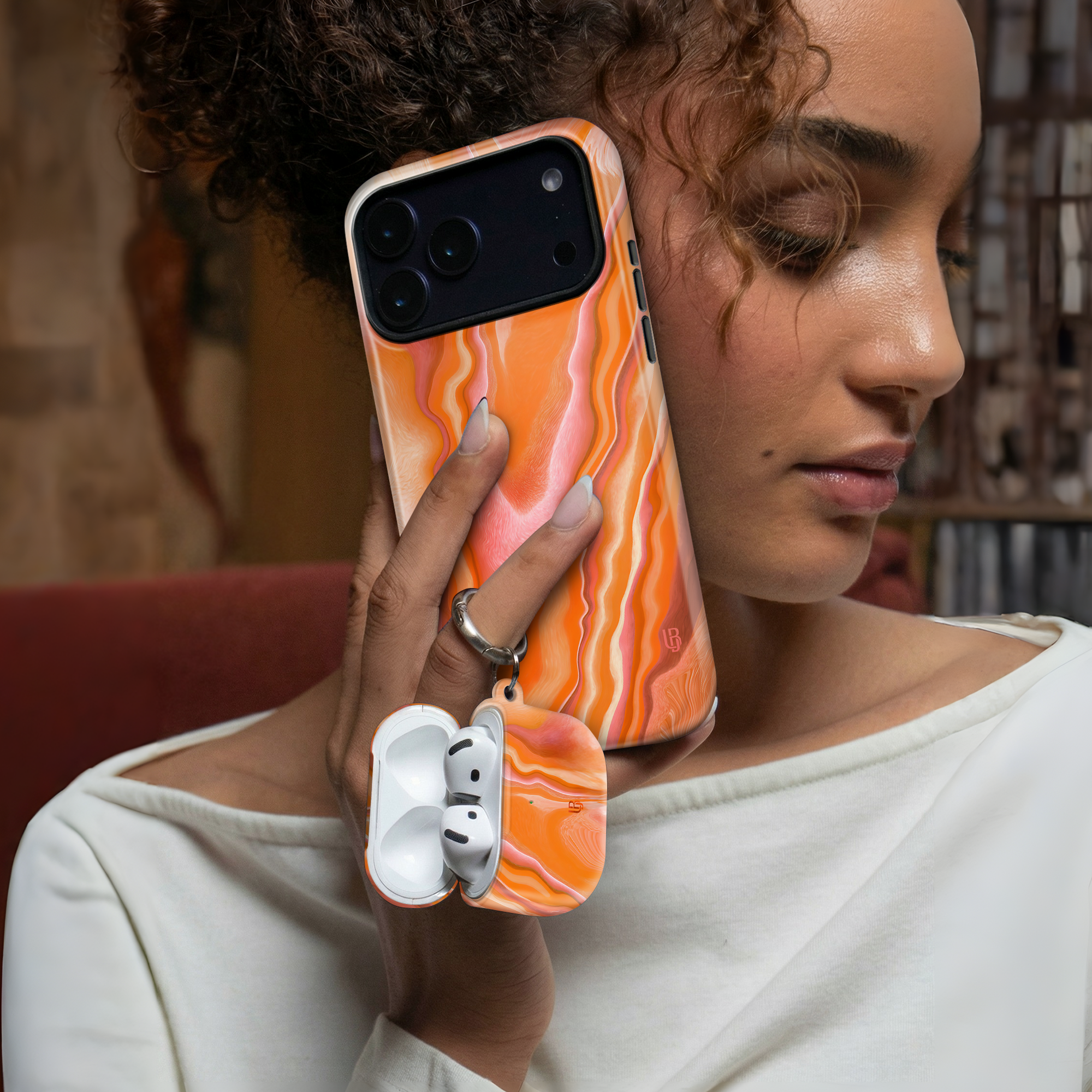 Sunset Agate Ultrabling AirPods case detail view