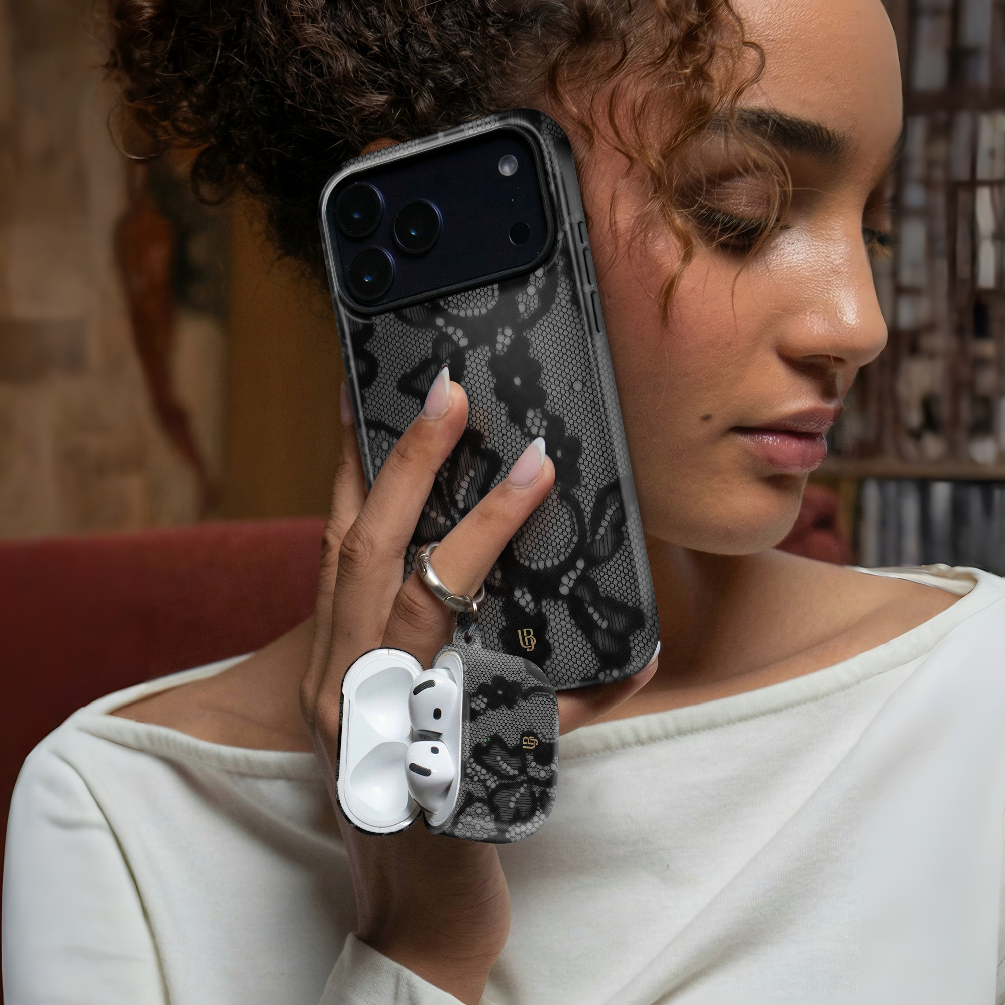 Noir Lace Ultrabling AirPods case detail view