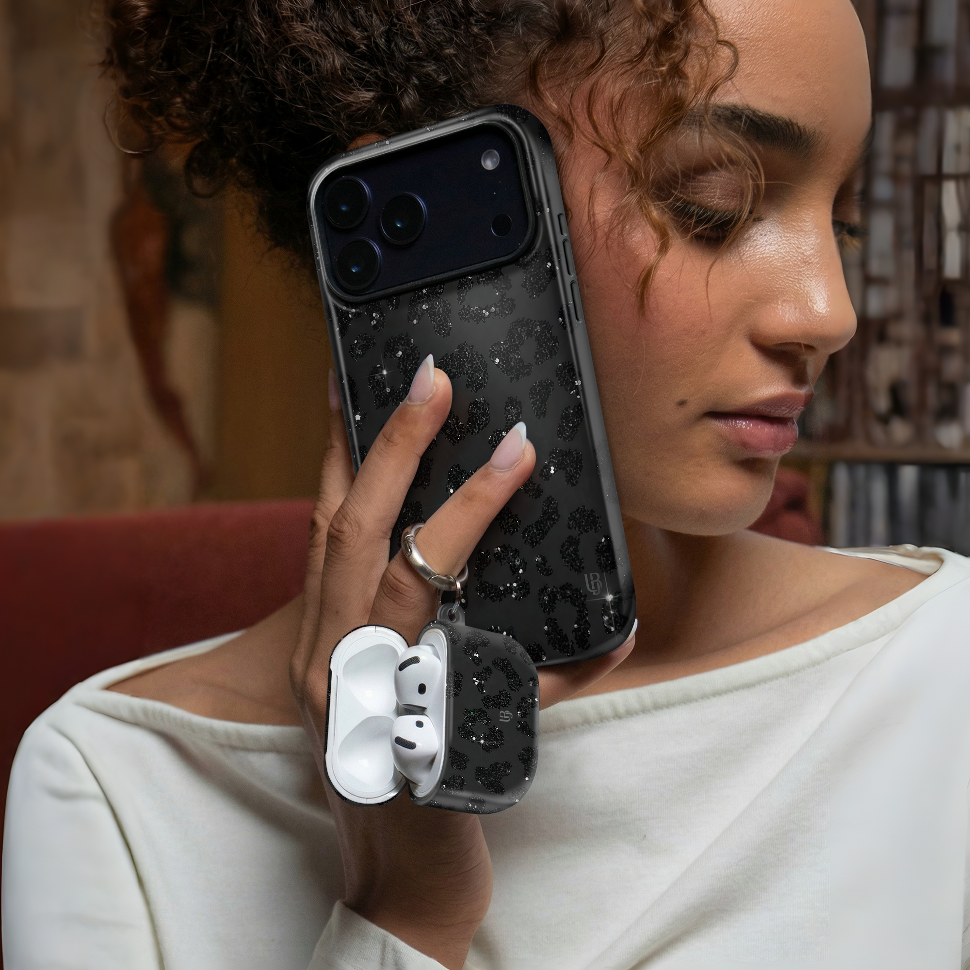 Black Stardust Ultrabling AirPods case detail view