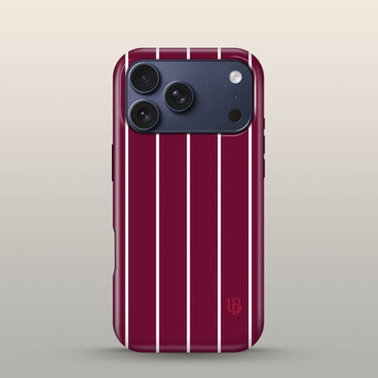 Maroon Pinstripe Eclipse Case on iPhone 17 Pro Deep Blue